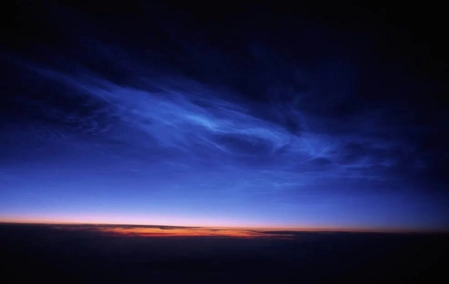 Mysterious Noctilucent Clouds Shine After Sunset