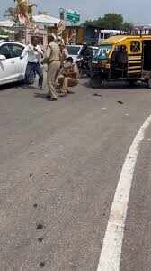 High Voltage Drama: Drunkard vs. Police in Street Showdown