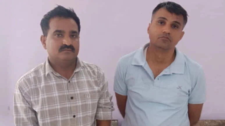 SHO and Constable Caught Accepting ₹800,000 Bribe, Demanded ₹2,000,000