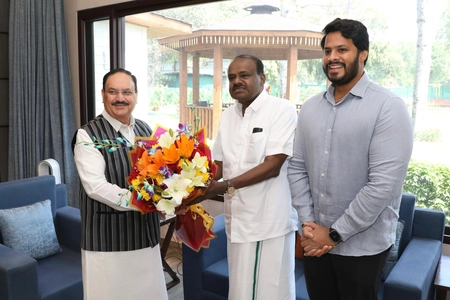 JDS Leaders HD Kumaraswamy and Nikhil Kumar Meet JP Nadda