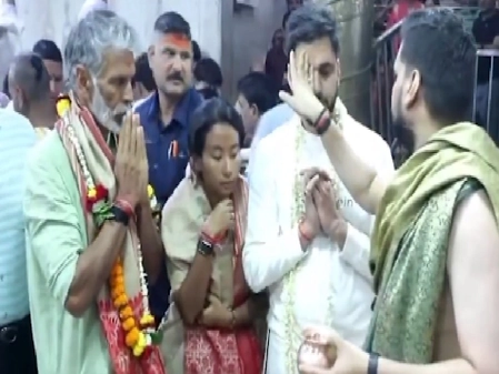 Milind Soman Visits Baba Mahakal with Wife Ankita Kunwar