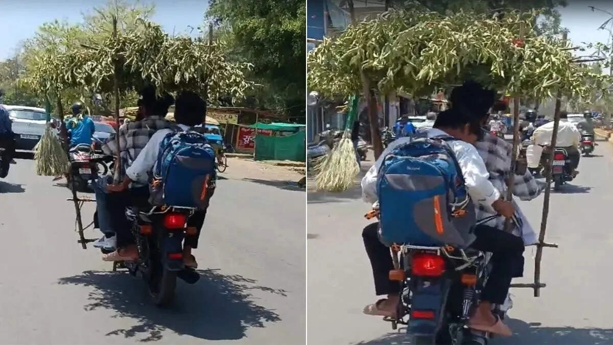 जबलपुर युवक का अनोखा जुगाड़: बाइक पर पत्तों की छत