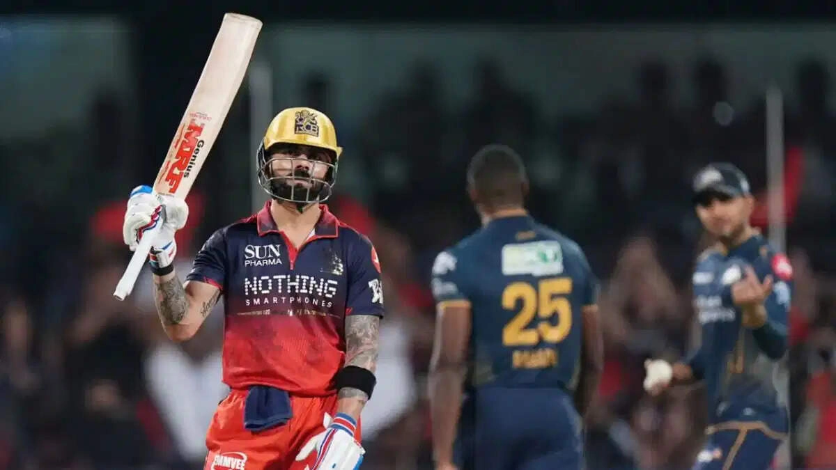 RCB Storms to Victory: Kohli and Padikkal Crush Gujarat Titans