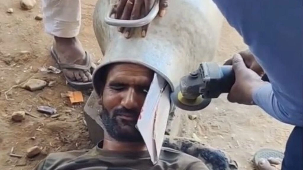 Man Rescued After Getting Head Stuck in Milk Can