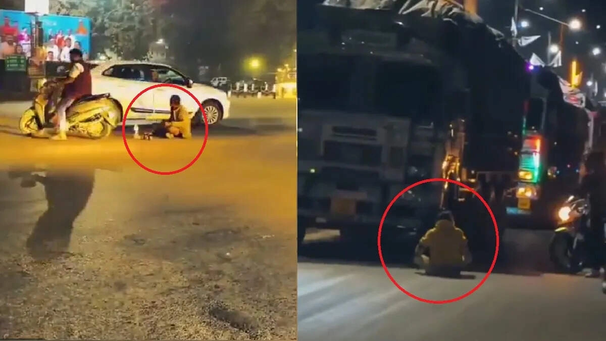 Man Drinks at Intersection Despite Passing Vehicles - VIDEO