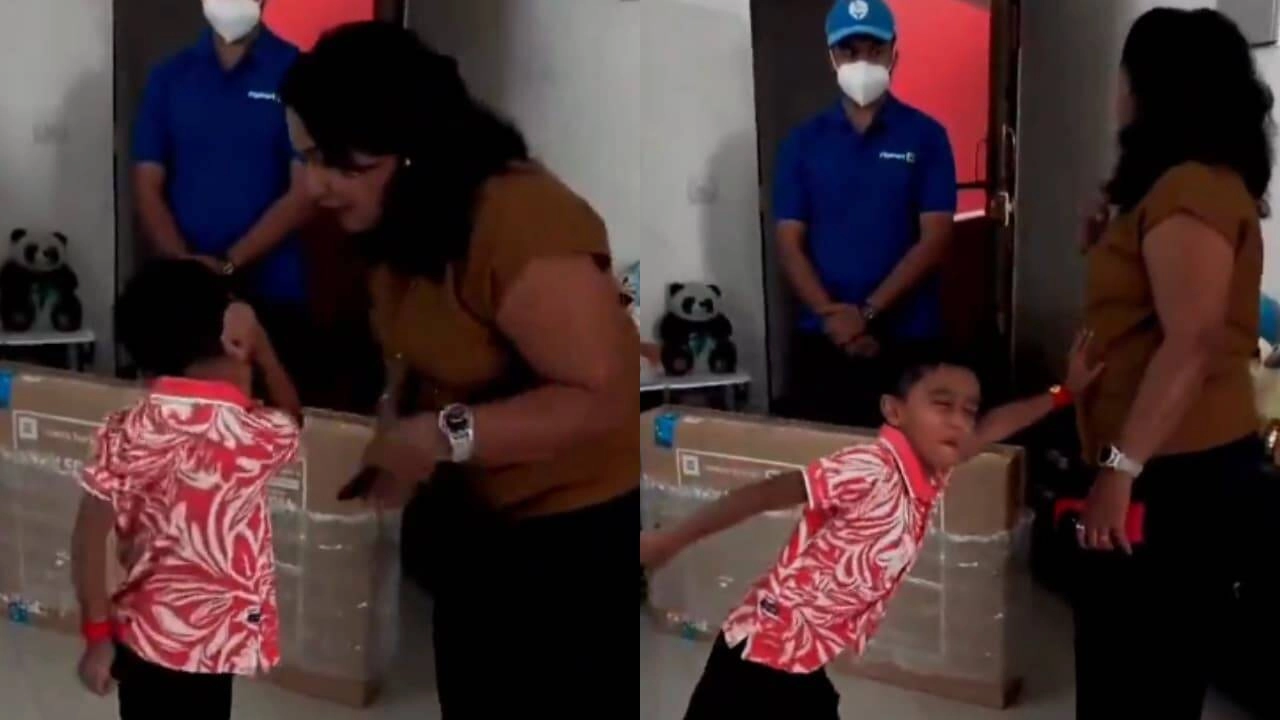 VIDEO: Mom Shocked by 65-Inch TV, Kid Gets Beat in Front of Delivery