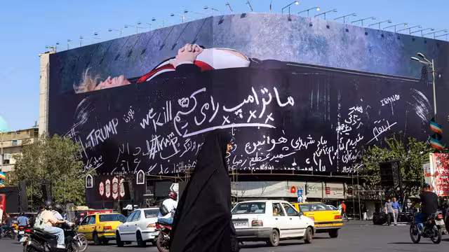 Iran Billboard Sparks Outrage with Trump Threat Image