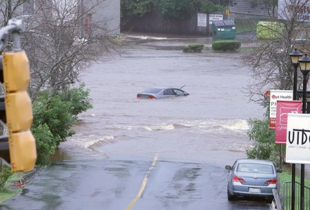 Canada's Dual Weather Crisis: Heat and Floods Devastate People