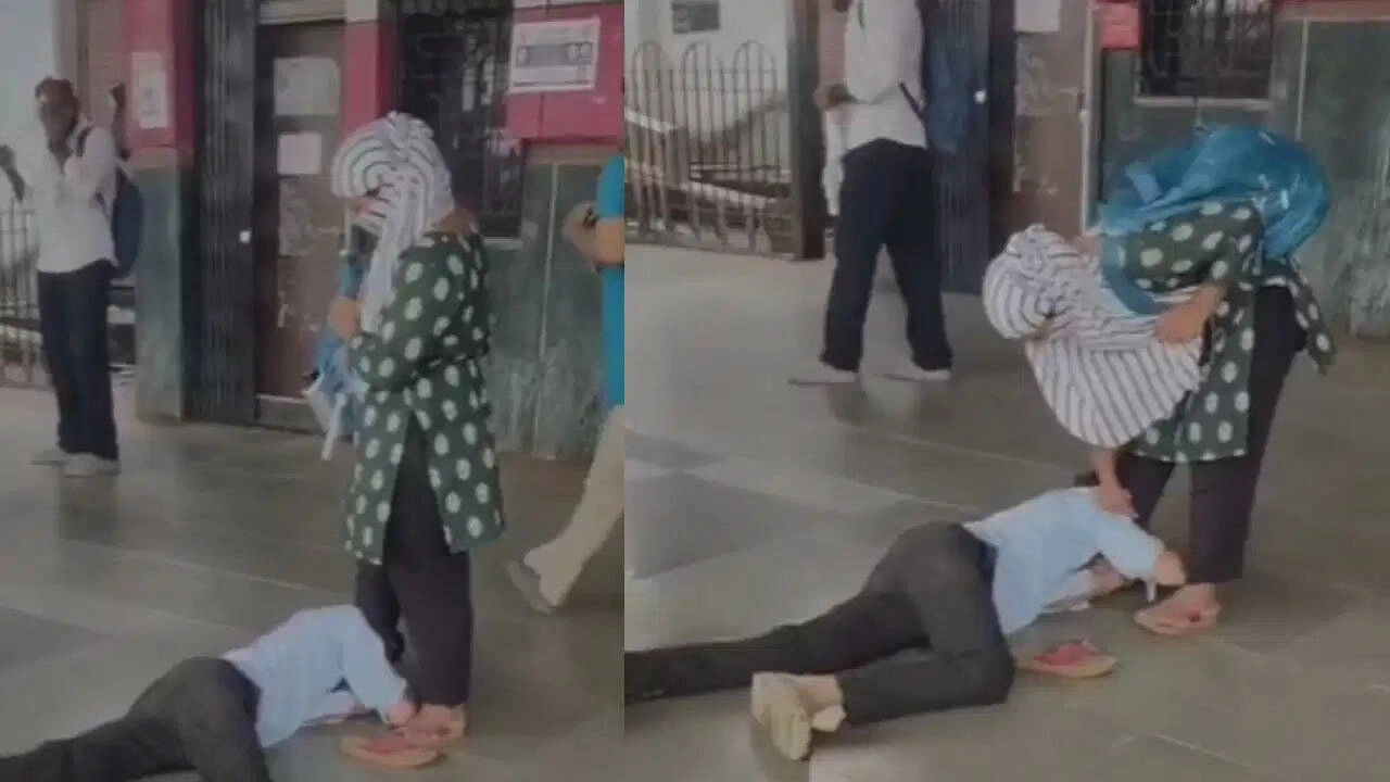 High-Voltage Drama at Borivali Station: Man Falls at Girlfriend's Feet
